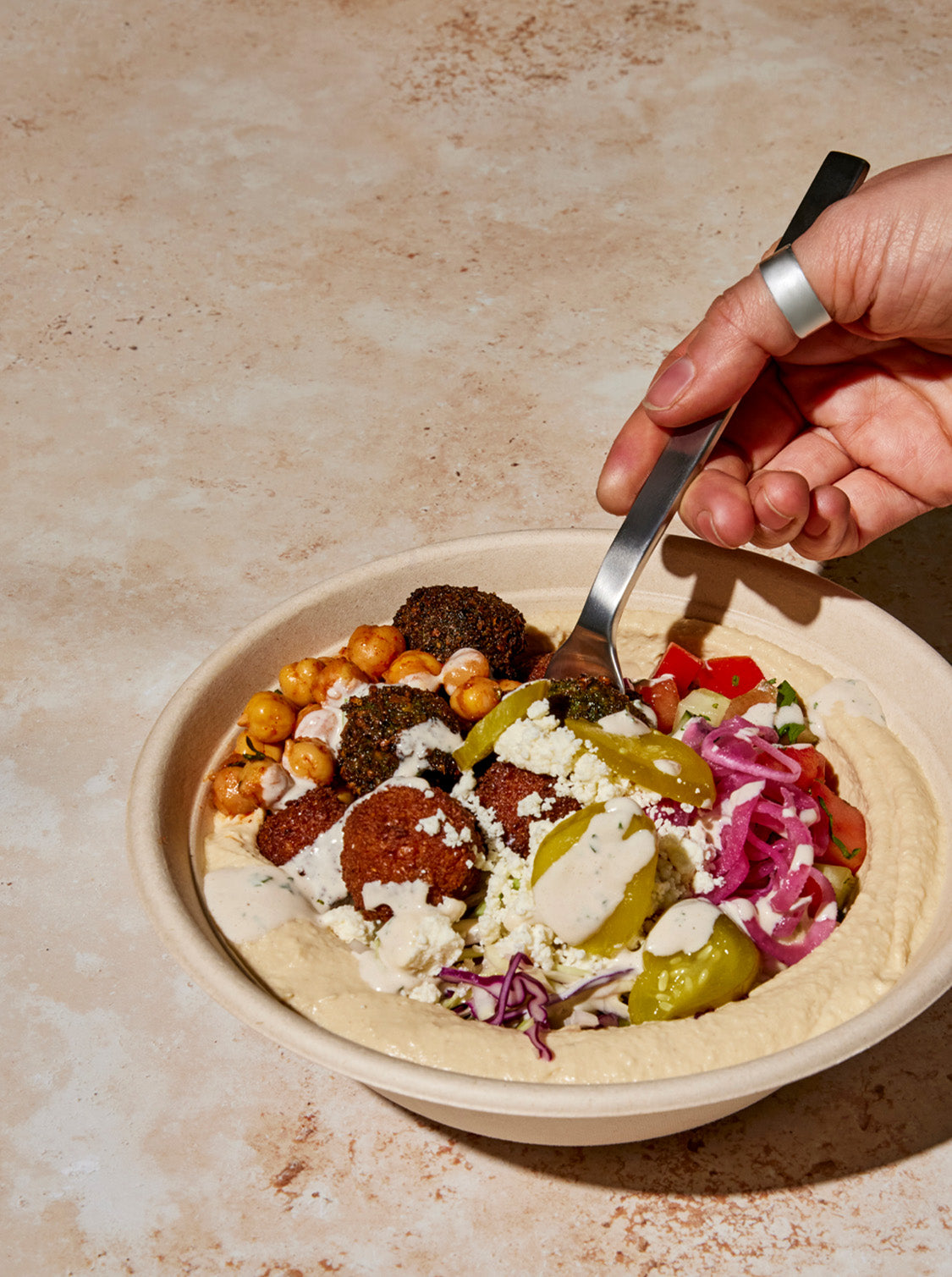 Build your dream bowl or pita from scratch