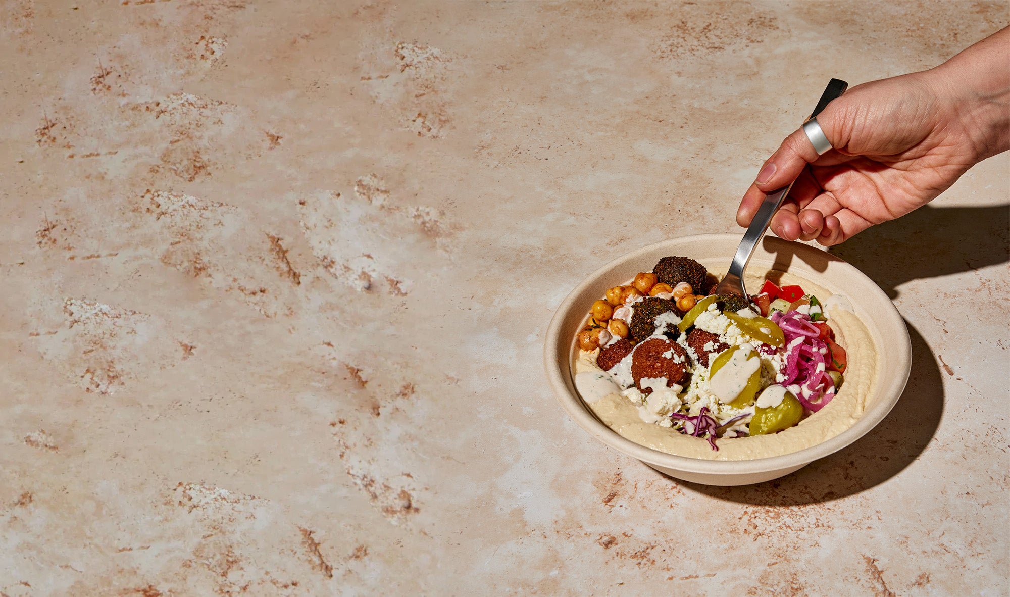 Build your dream bowl or pita from scratch